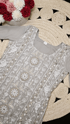 TARA GHARARA GREY