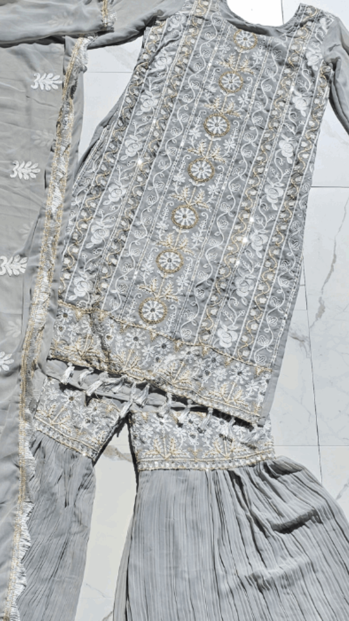 TARA GHARARA GREY